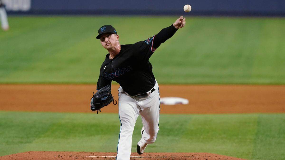 Miami Marlins starting pitcher Braxton Garrett aims a pitch during the second inning of a baseball game against the Washington Nationals, Friday, Sept. 23, 2022, in Miami. (AP Photo/Marta Lavandier)