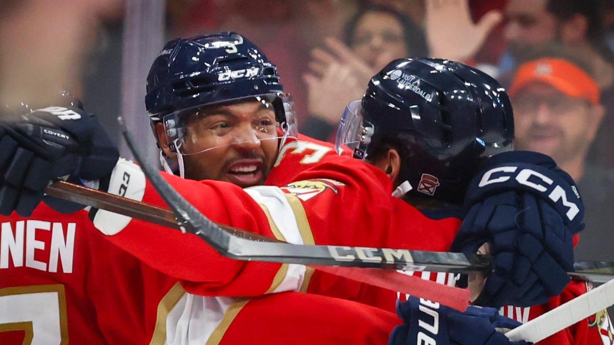 Florida Panthers defenseman Seth Jones (3) gets a group hug after scoring a goal during the third period of Game 4 of the first-round Stanley Cup playoff series against the Tampa Bay Lightning on Monday, April 28, 2025, at Amerant Bank Arena in Sunrise, Fla. The Panthers won 4-2.