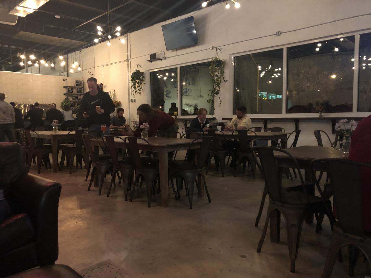 Unseen Creatures, a new brewery in the Bird Road Art District, has wide windows that overlooks the buzzing traffic on the Palmetto Expressway and Bird Road.