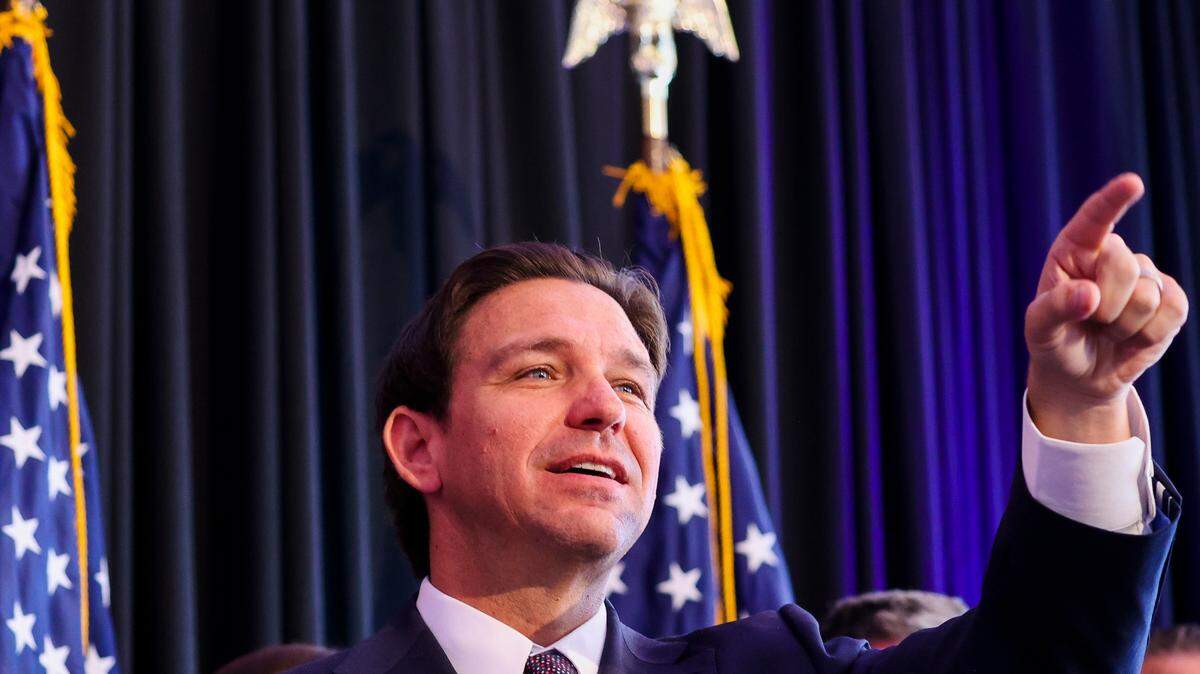 Gov. Ron DeSantis points to a supporter while on stage during a campaign event Thursday, Oct. 5, 2023 in Tampa.