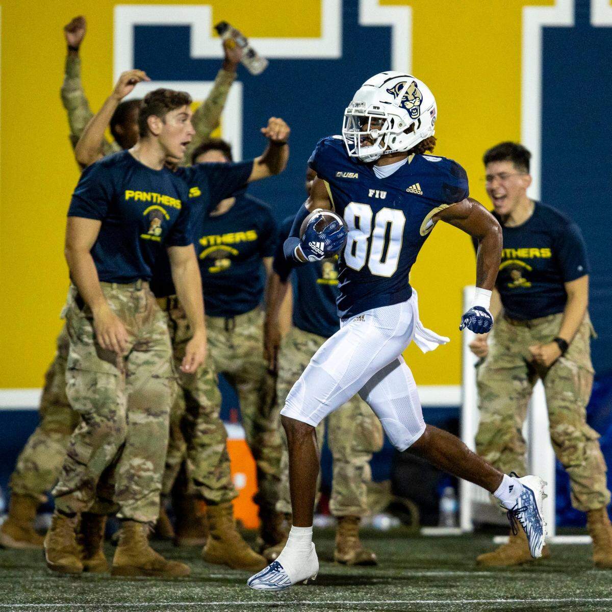 Florida International University wide receiver Kris Mitchell (80) scores a touchdown during the fourth quarter of an NCAA Conference USA football game against Bryant University at Riccardo Silva Stadium in Miami, Florida, on Thursday, September 1, 2022.