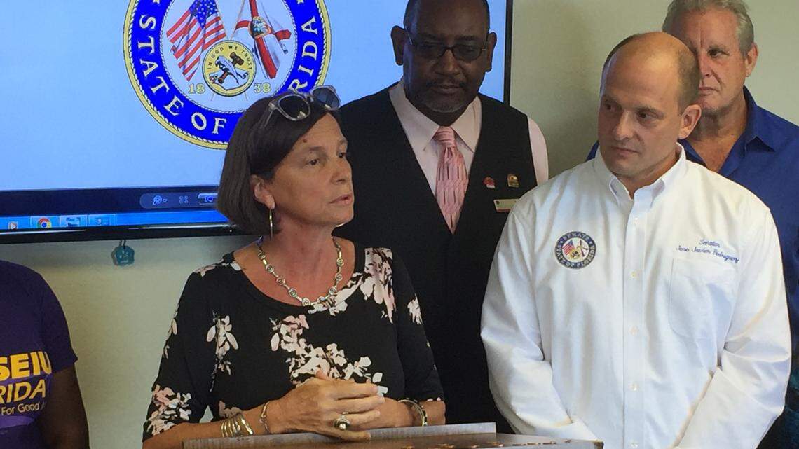 Monica Russo, executive vice president for SEIU 1199, a union representing workers in Miami, speaks alongside state Sen. Jose-Javier Rodriguez at an Oct. 15 press conference in support of higher wages for Miami workers. Florida’s annual minimum wage increase, tied to increases in inflation, kicks in Jan. 1. It will climb from $8.25 to $8.46.
