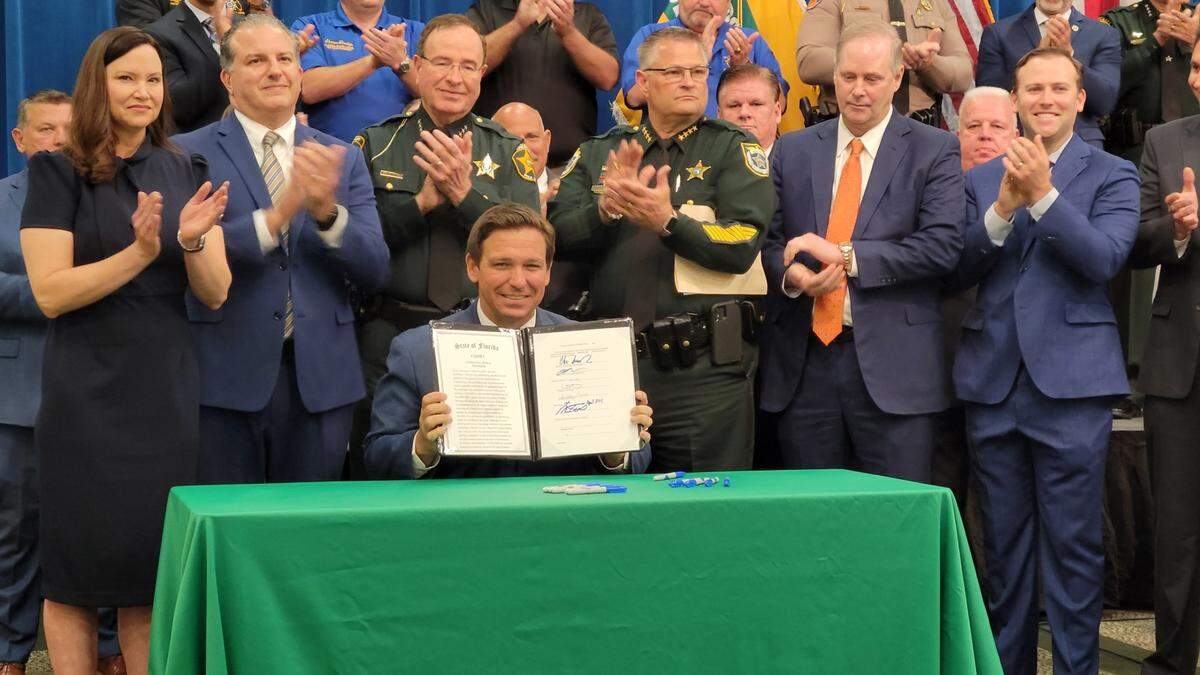Florida Gov. Ron DeSantis signed what supporters call “anti-mob” legislation in Polk County on Monday.