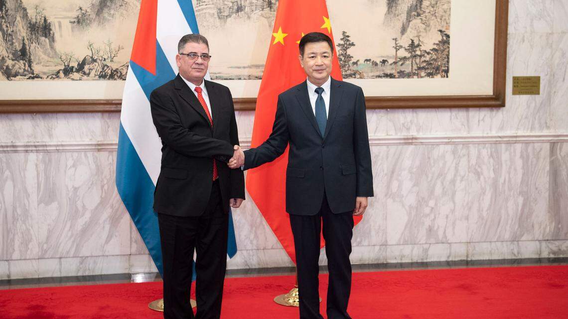 Chinese Minister of Public Security Wang Xiaohong meeting with Cuban Minister of Interior Lazaro Alberto Alvarez Casas in Beijing on May 20, 2023.