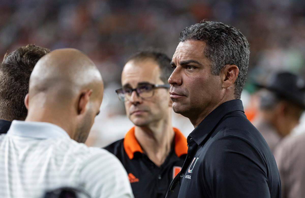 City of Miami Mayor Francis Suarez looks on from the sidelines of the Miami Hurricanes as they play an NCAA college football game against the South Florida Bulls at the Raymond James Stadium on Saturday, Sept. 21, 2024, in Tampa.