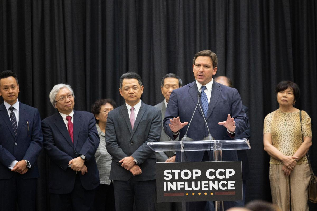 Gov. Ron DeSantis reacts while being questioned about the migrants that were dumped in Martha’s Vineyard, Massachusetts, last week during a press conference on Thursday, Sept. 22, 2022, at the Miami Dade College Wolfson Campus.