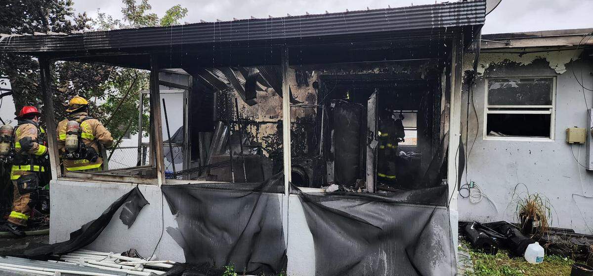 A fire engulfed a house, 1106 NW 11th Place, where two adults and three children were staying on Monday, Dec. 25, 2023.