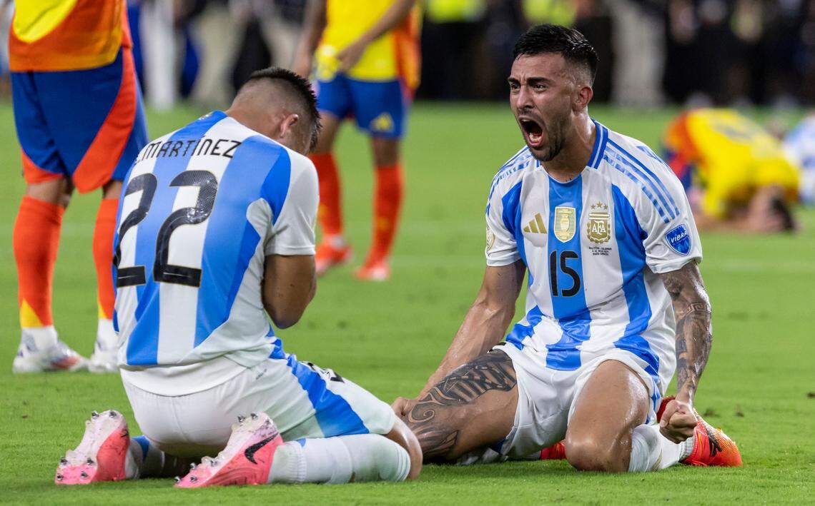 Argentina forward Nicolás González (15) celebrates with Lautaro Martínez (22) after defeating Colombia in their Copa America 2024 Final soccer match at Hard Rock Stadium on Sunday, July 14, 2024, in Miami Gardens, Fla.