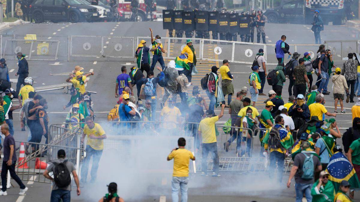 Supporters of Brazil’s former President Jair Bolsonaro invaded the Congress building, supreme court and presidential palace, photos show.