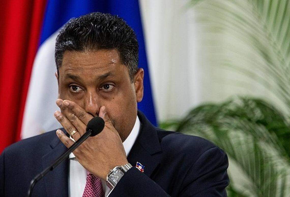 Haitian Prime Minister Alix Didier Fils-Aime (C) attends the end-of-term ceremony of the Presidential Transitional Council (CPT) in Port-au-Prince on February 7,2026. Nearly two years after it was created to restore order in impoverished, violence-ravaged Haiti, the transitional council is ending its work -- with no end to the crisis in sight. (Photo by Clarens SIFFROY / AFP via Getty Images)