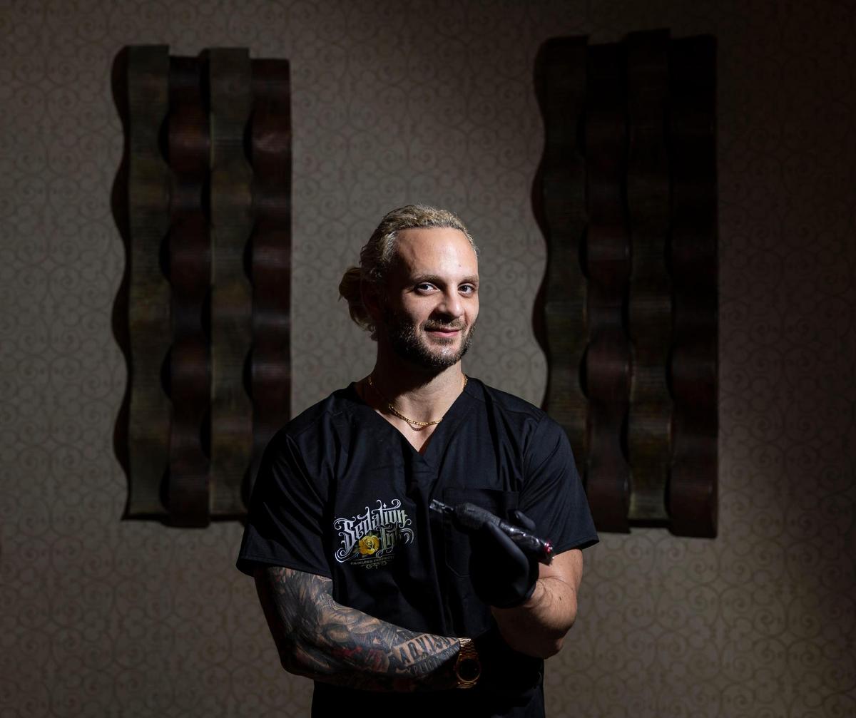 Sedation Ink CEO Michael Zuratti, 35, is photographed at a surgical office where one of his clients is being tattooed on Monday, Jan. 20, 2025, in Miami, Fla. Sedation Ink offers tattooing under anesthesia, allowing clients to complete extensive body art in a single session.