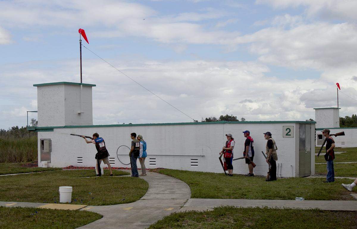 Competitors wait their turns as the Miami International Skeet Shooting Club hosted THE 2015 MIAMI CUP at Trail Glades Range. on Sunday January 18, 2015.