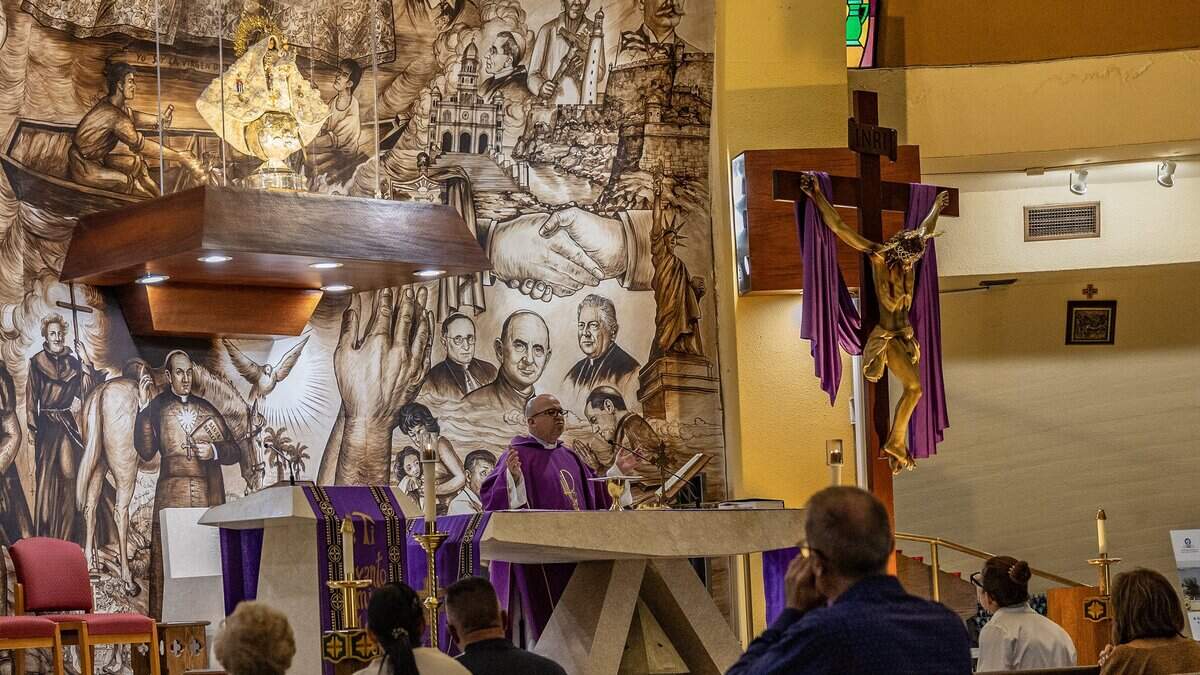 Father Eliosbel Pereira Almaguer, Parochial Vicar at La Ermita de Caridad-Our Lady of Charity National Shrine, in Miami leads a mass, hours after Cuban leader Miguel Díaz-Canel had confirmed that Havana is in the midst of talks with the Trump administration, on Friday, March 13, 2026.
