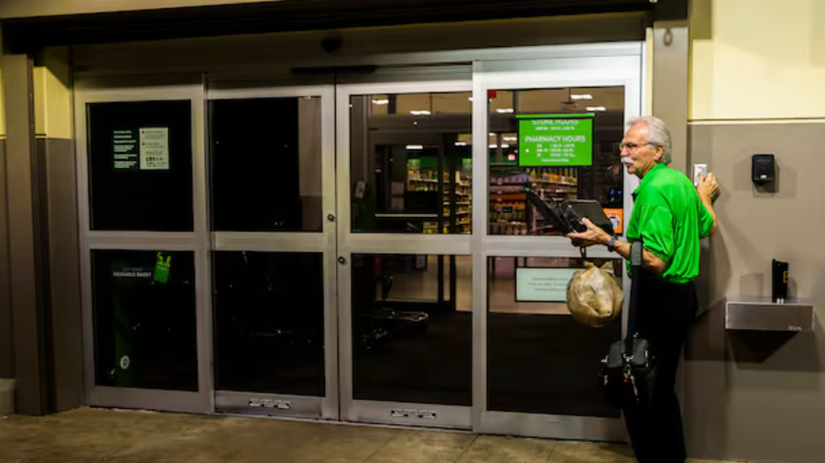 Larry Gesick swipes into work. He’s part of a wave of older Floridians in the workforce.