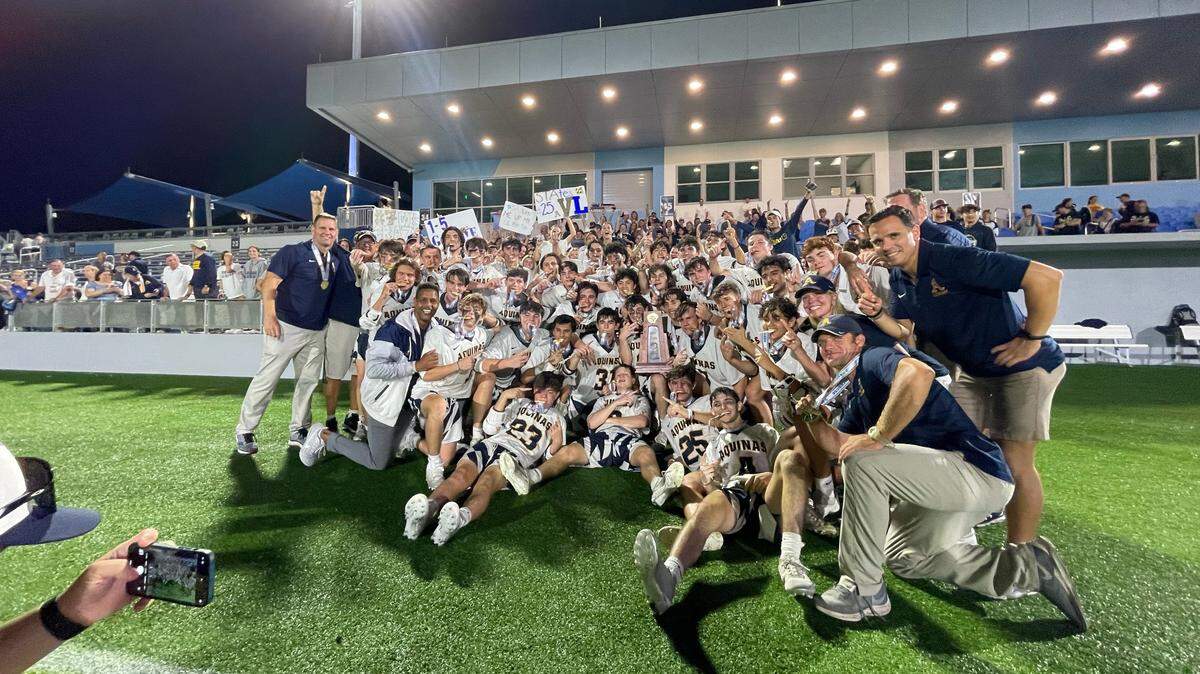 The St. Thomas Aquinas boys’ lacrosse team celebrates its third state championship after a thrilling 13-12 win in the state championship game against Ponte Vedra late Saturday night in Naples.