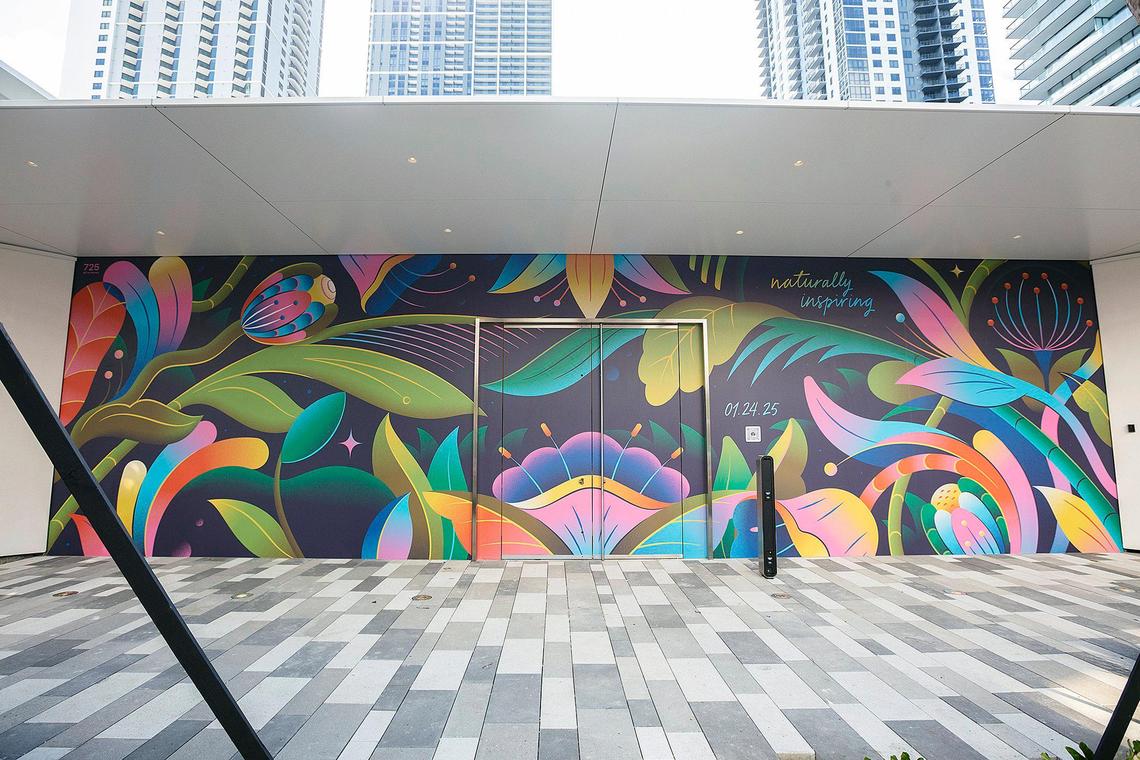 An exterior view of the banner in front of a coming new Apple Store set to open on Jan. 24, 2025 at Miami Worldcenter in downtown Miami. Apple did a curtain raiser on Friday, Jan. 10, 2025, to showcase the barricade and date.