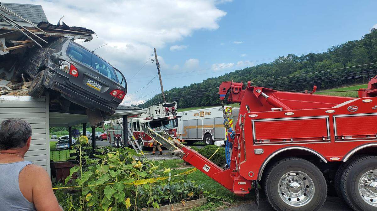 A car flew through the air and smashed into the second story of a Pennsylvania home, firefighters said.