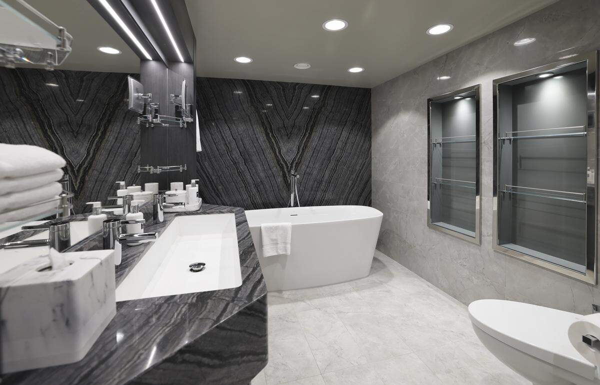 The master bath inside the Royal Suite in the MSC Yacht Club on MSC Poesia docked at PortMiami in Miami, Florida, on Wednesday, April 22, 2026. Built in 2008, it underwent refurbishment this year. This winter, it will be based at PortMiami heading on trips to the Caribbean.
