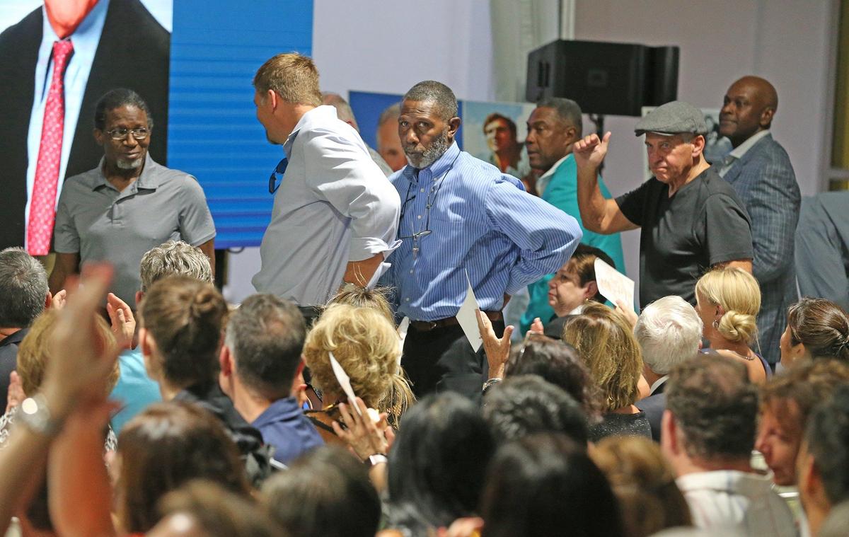 Former Dolphins players are acknowledged at the memorial service for Miami Dolphins legend Nick Buoniconti at the Lois Pope LIFE Center of The Miami Project in Miami, Florida, September 6, 2019.