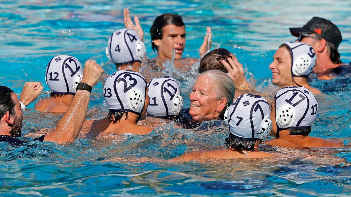 Gulliver Prep Boy’s Water Polo head coach Carroll Vaughan joins the team in the pool as they celebrate the win over Dr. Phillips High School for the Florida High School Water Polo State Championship game at Belen Jesuit Preparatory School in Miami, Florida on Saturday, April 20, 2024.
