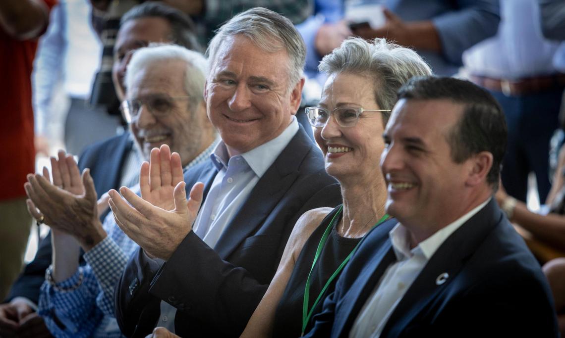 Ken Griffin, Citadel founder and CEO, at center, applauds Friends of the Underline founder and CEO Meg Daly, second from right, during a groundbreaking ceremony Tuesday, Sept. 12, 2023, at the University Metrorail Station for the third and final phase of The Underline linear park and trail.