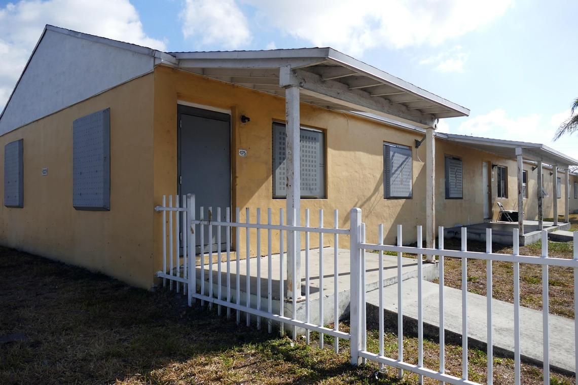 Many units in the Liberty Square housing complex are boarded shut because residents have been relocated into other renovated units during construction of a new housing project in the area.
