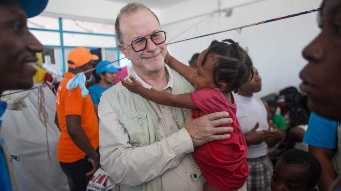 March 18, 2025 - UNICEF Deputy Executive Director Ted Chaiban holds a child at the IDP site in Lycée Marie Jeanne, Port-au-Prince, Haiti.