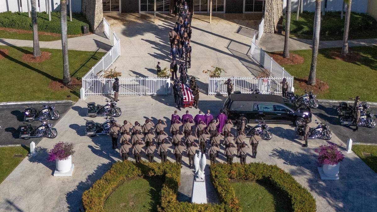 Funeral procession for Deputy Devin M. Jaramillo to Loan Depot Park following mass at St. Michael The Archangel Catholic Church in Miami, Florida, on Tuesday, November 18, 2025. Deputy Devin M. Jaramillo, died on the line of duty November 7 after being shot in southwest Miami-Dade County.
