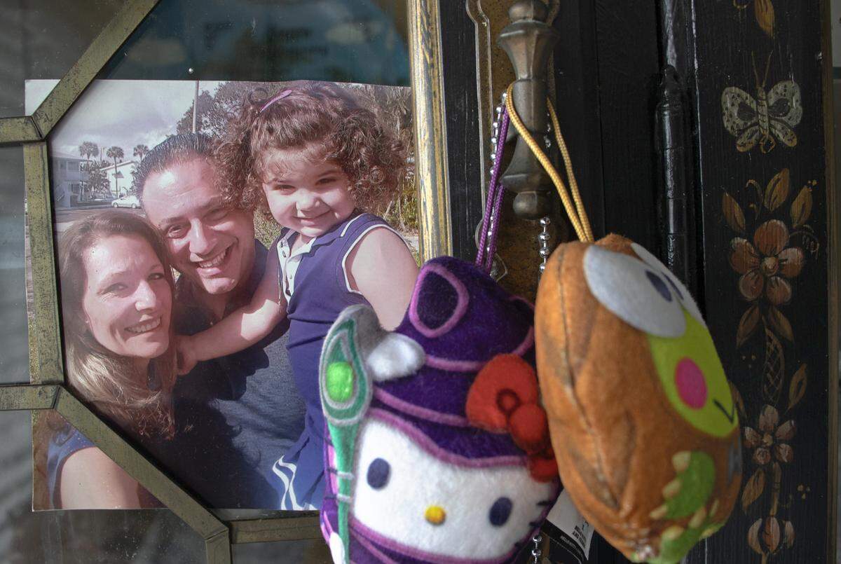 Stella Georgakopoulos with her husband, George, and their daughter, Marianna.