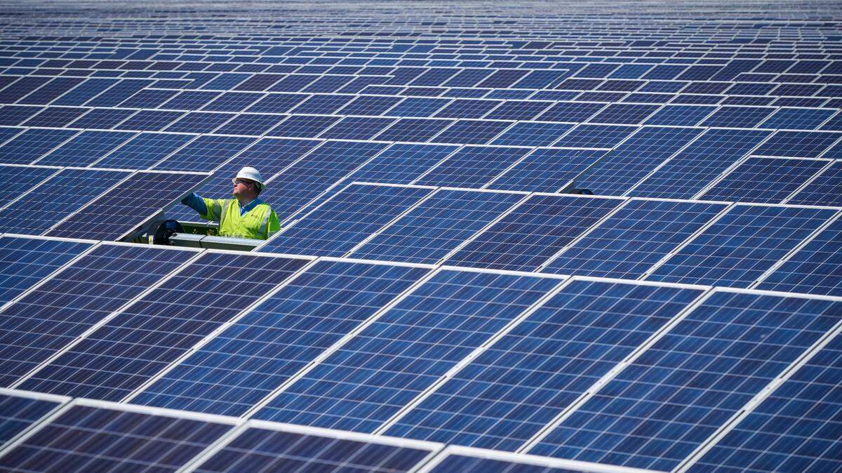 Employee Bilbo Garrison working on solar panels at Capital Partners Solar in Elizabeth City, North Carolina.