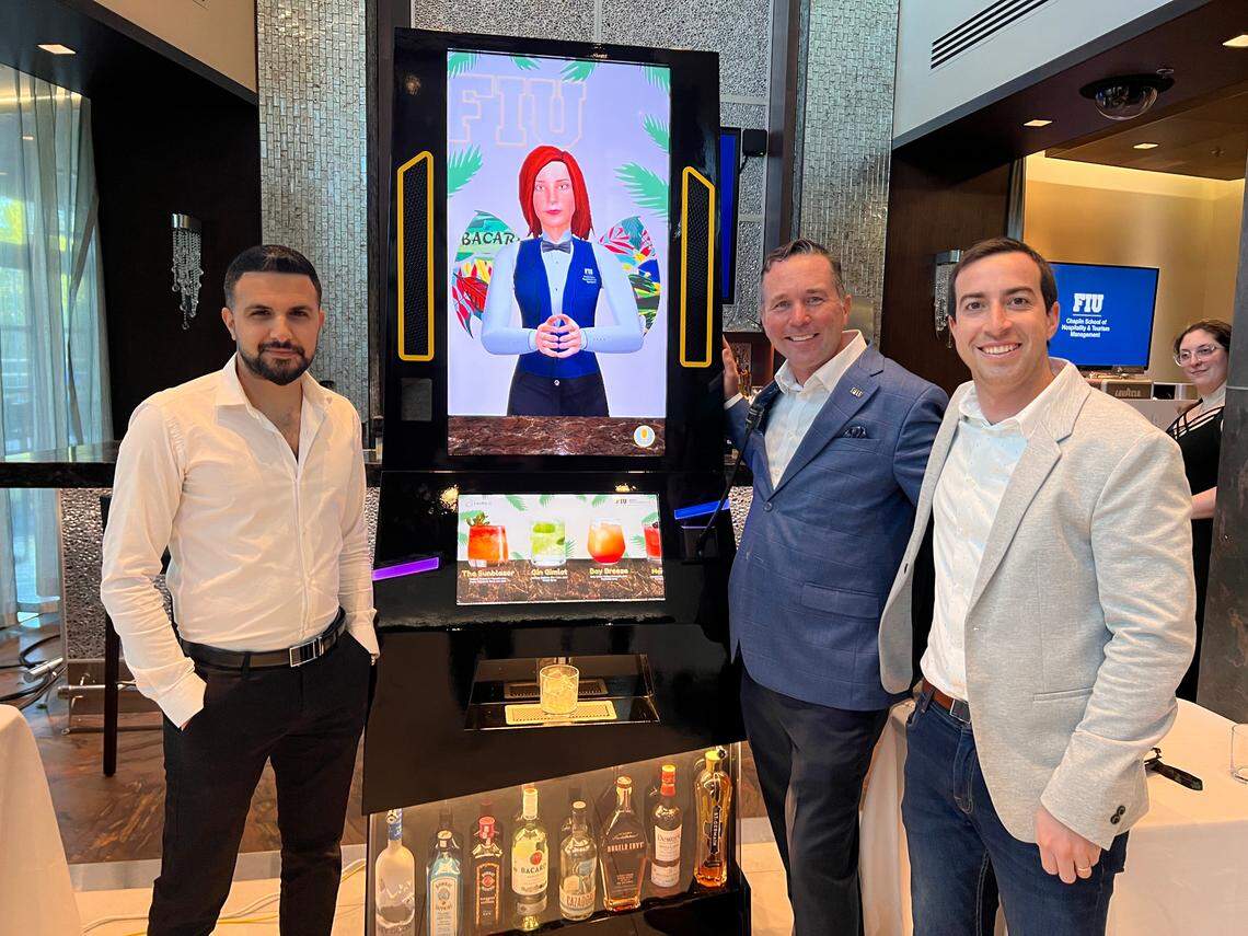 Cecilia.ai CEO Elad Kobi; Brian Connors, director of the Bacardi Center of Excellence at FIU; and Cecilia co-creator Nir Cohen Paraira with Cecilia, the first robot bartender.