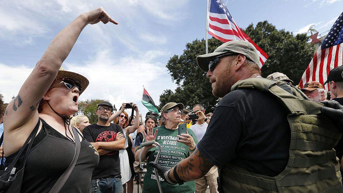 Protesters and counter-protesters argue during a demonstration in New Orleans, held in solidarity with the 2017 Charlottesville, Virginia, protests that left one woman dead. |