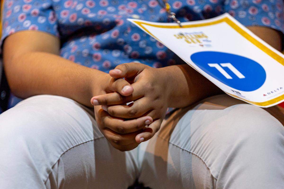 Tanush Sajja from Nova Middle School fiddles his fingers during the 4th round of the Miami Herald Broward County Spelling Bee at NSU Art Museum in Fort Lauderdale, Florida on Thursday, March 7, 2024.