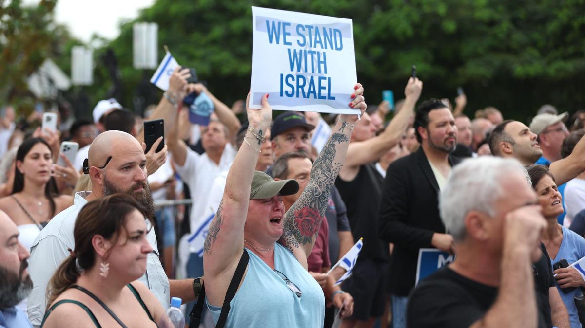 A woman cries as she shows her support for Israel at the Holocaust Memorial on Tuesday, Oct. 10, 2023, in Miami Beach, Fla. People gathered to show solidarity with Israel after Hamas militants launched a deadly assault on the country from Gaza.