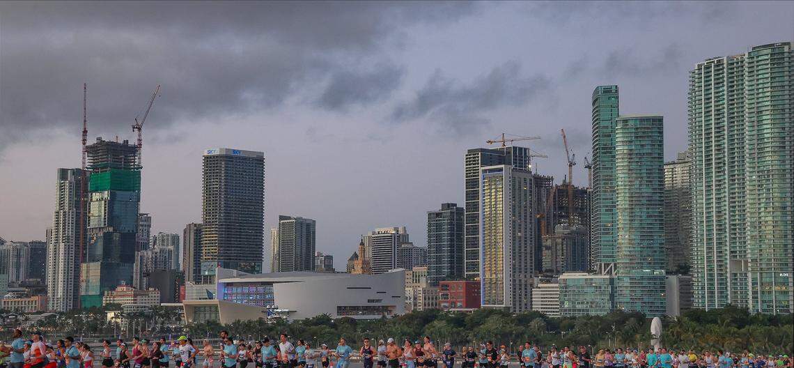 Runners head eastbound on the MacArthur Causeway, against the partial skyline at the Life Time Miami Marathon & Half on Sunday, January 25, 2026, in Miami, Florida.