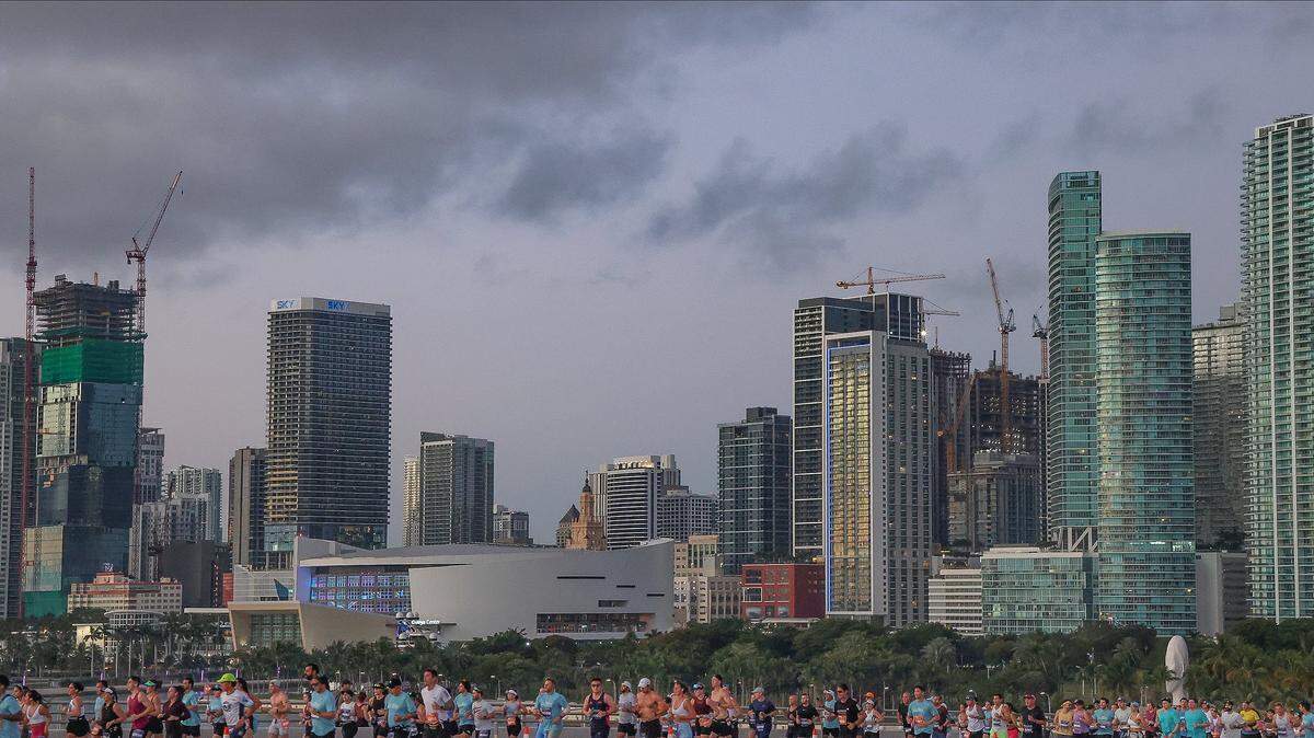 Runners head eastbound on the MacArthur Causeway, against the partial skyline at the Life Time Miami Marathon & Half on Sunday, January 25, 2026, in Miami, Florida.