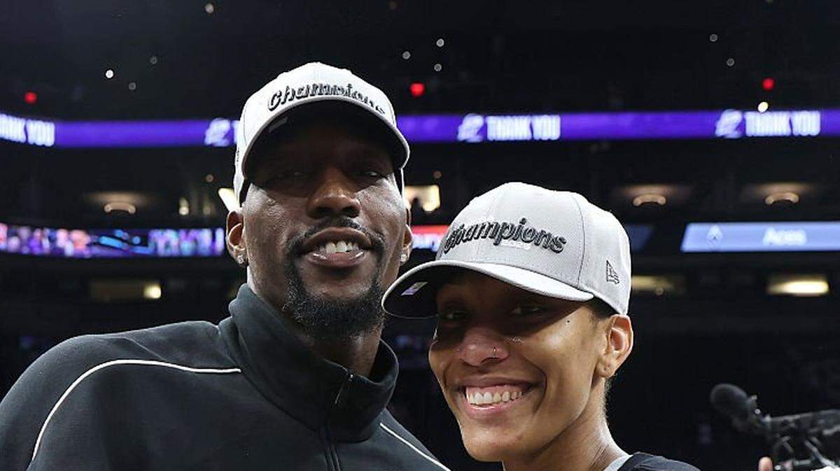 PHOENIX, ARIZONA - OCTOBER 10: A'ja Wilson #22 of the Las Vegas Aces poses with the Most Value Player award and Bam Adebayo after winning Game Four of the 2025 WNBA Playoffs finals at Mortgage Matchup Center on October 10, 2025 in Phoenix, Arizona. The Las Vegas Aces defeat the Phoenix Mercury 97-86 to win the championship. NOTE TO USER: User expressly acknowledges and agrees that, by downloading and or using this photograph, User is consenting to the terms and conditions of the Getty Images License Agreement.  (Photo by Christian Petersen/Getty Images)