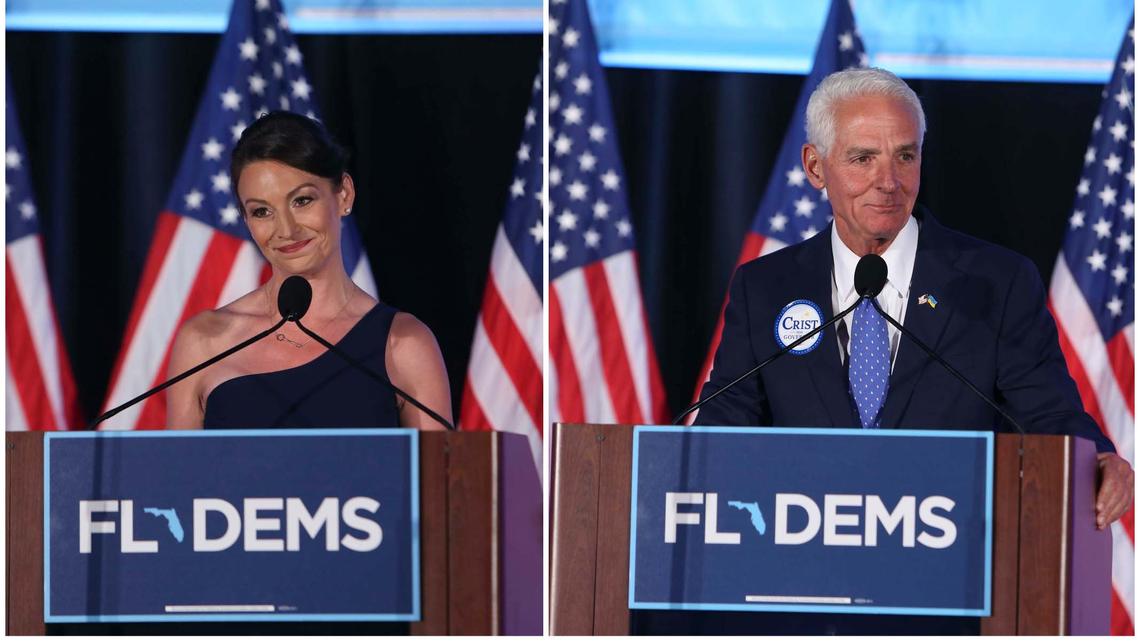 Florida commissioner of agriculture Nikki Fried and Congressman Charlie Crist speak on stage during the Leadership Blue Gala for the Florida Democratic Party on Saturday, July 16, 2022 in Tampa.