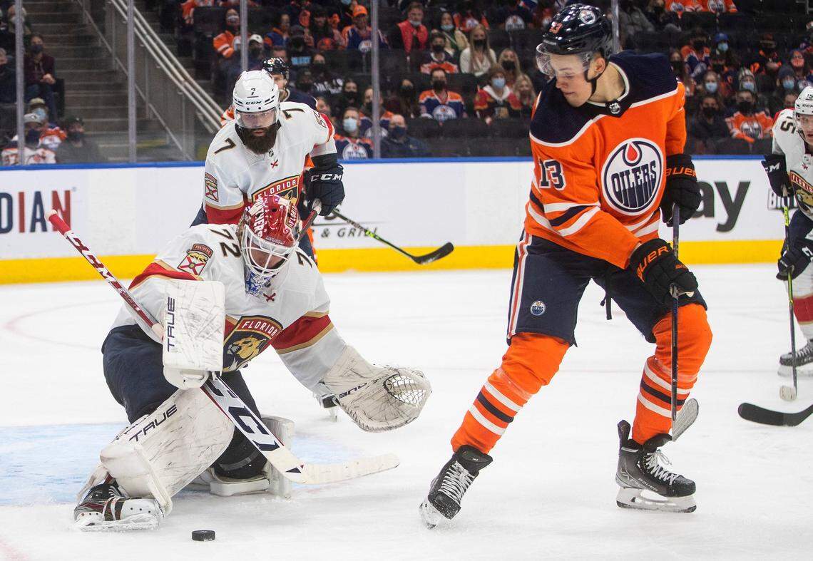 Florida Panthers’ Sergei Bobrovsky (72) makes a save on Edmonton Oilers’ Jesse Puljujarvi (13) during the second period of an NHL hockey game Thursday, Jan. 20, 2022, in Edmonton, Alberta.