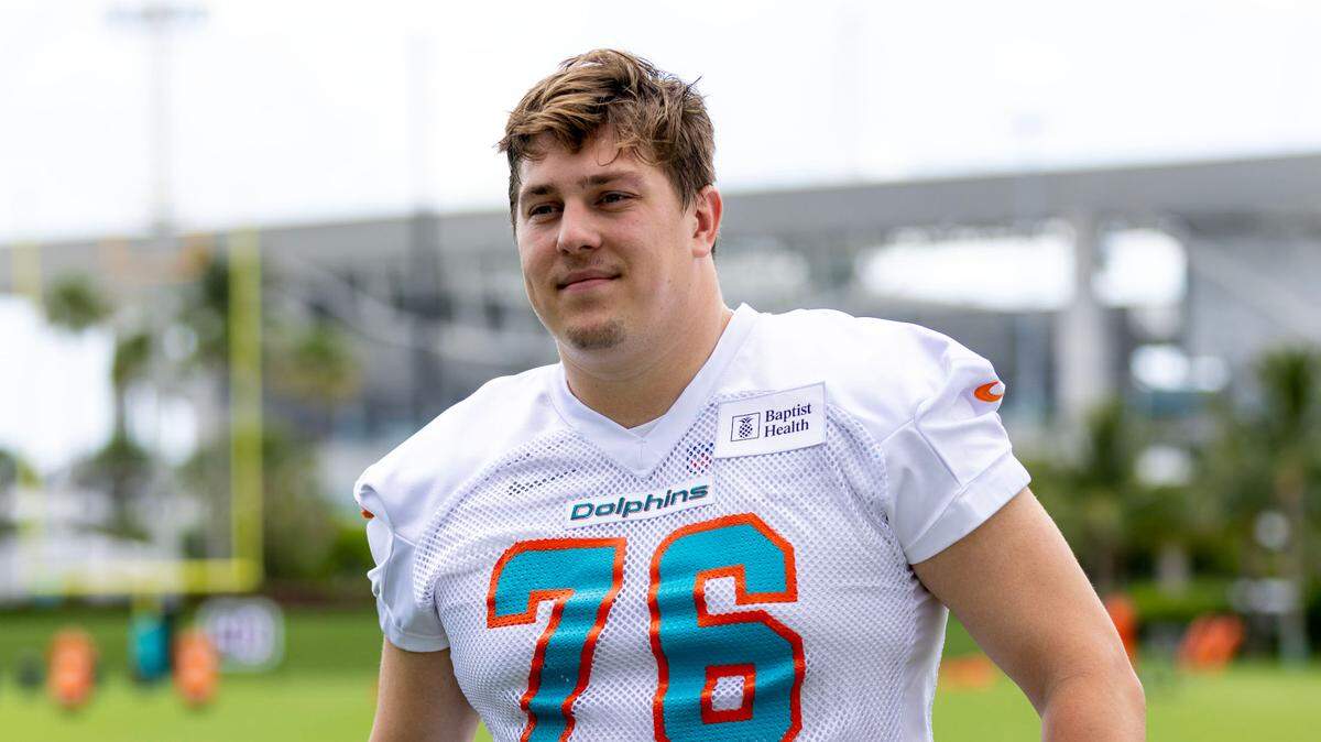 Rookie tackle Ryan Hayes (76) speaks to the media during 2023 Miami Dolphins Rookie Minicamp at Baptist Health Training Complex in Miami Gardens, Florida, on Friday, May 12, 2023.