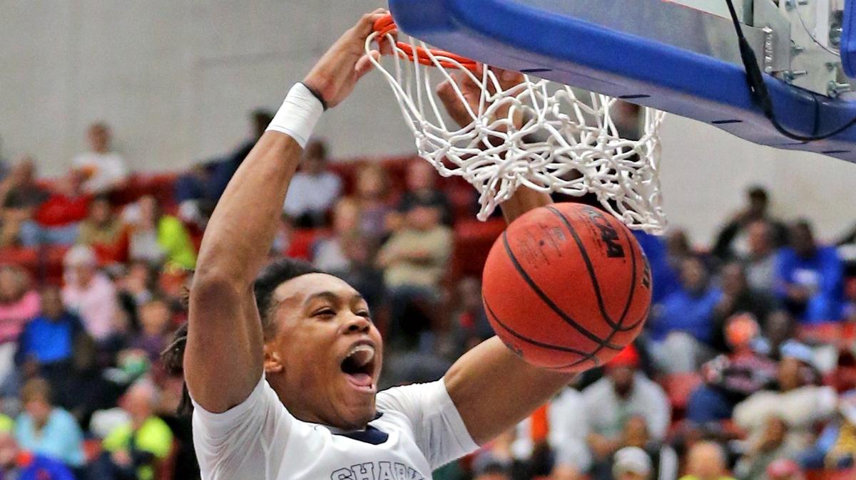 University School Scottie Barnes (23) dunks the ball as they play The Villages Charter in the Class 5A Boy’s Semi-Finals State Basketball Championships at the RP Funding Center in Lakeland, Florida, Wednesday, March, 6, 2019.
