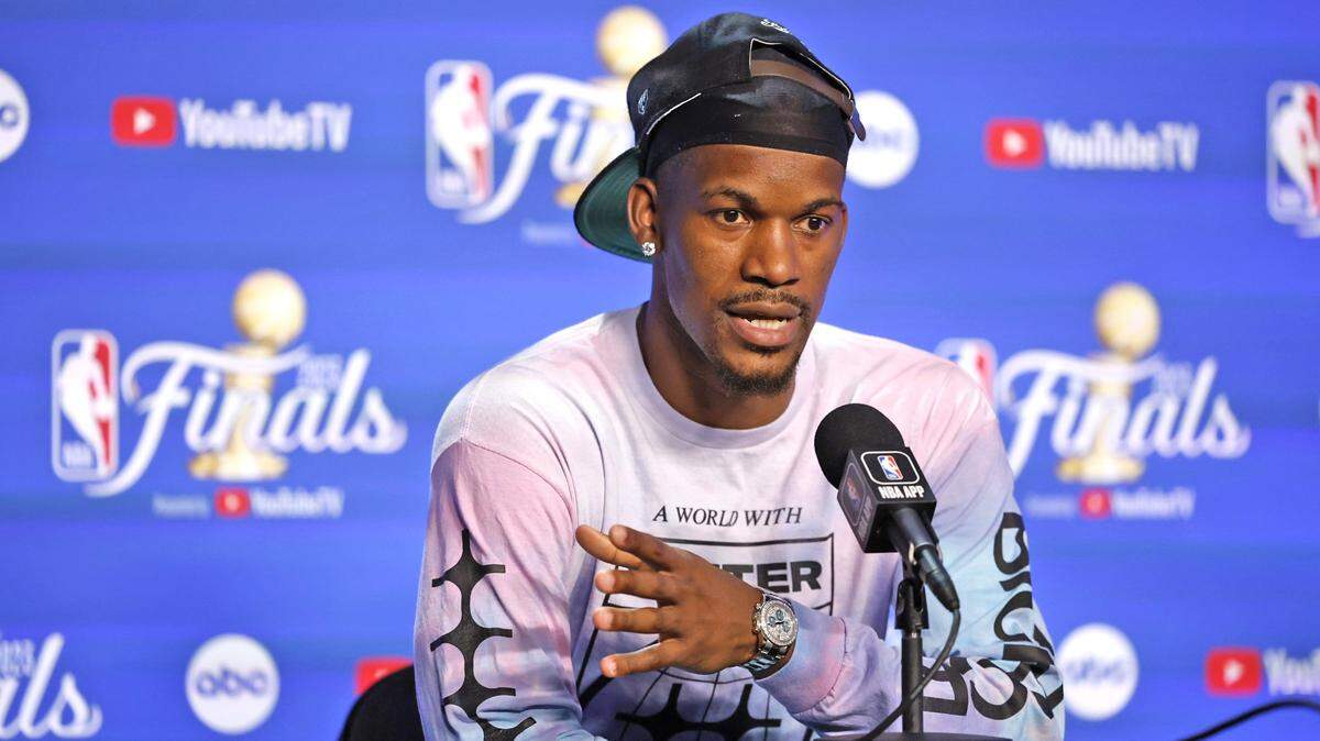 Miami Heat forward Jimmy Butler (22) speaks to reporters during the NBA Finals media day on Tuesday at Kaseya Center on Tuesday, June 6, 2023.