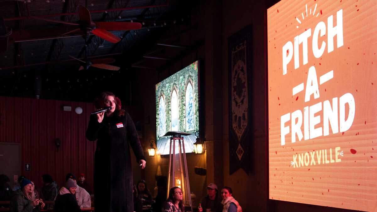 Host Renée Safir welcomes guests to the Pitch-A-Friend event at Schulz Bräu Brewing on January 29, 2026, in Knoxville, Tennessee.