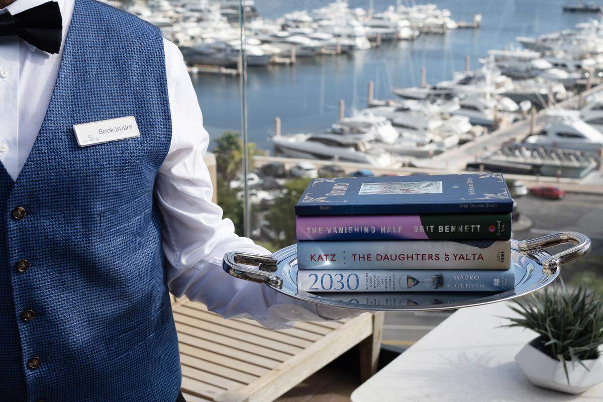 The Ben’s whimsical Book Butler delivers curated reads on a silver platter.