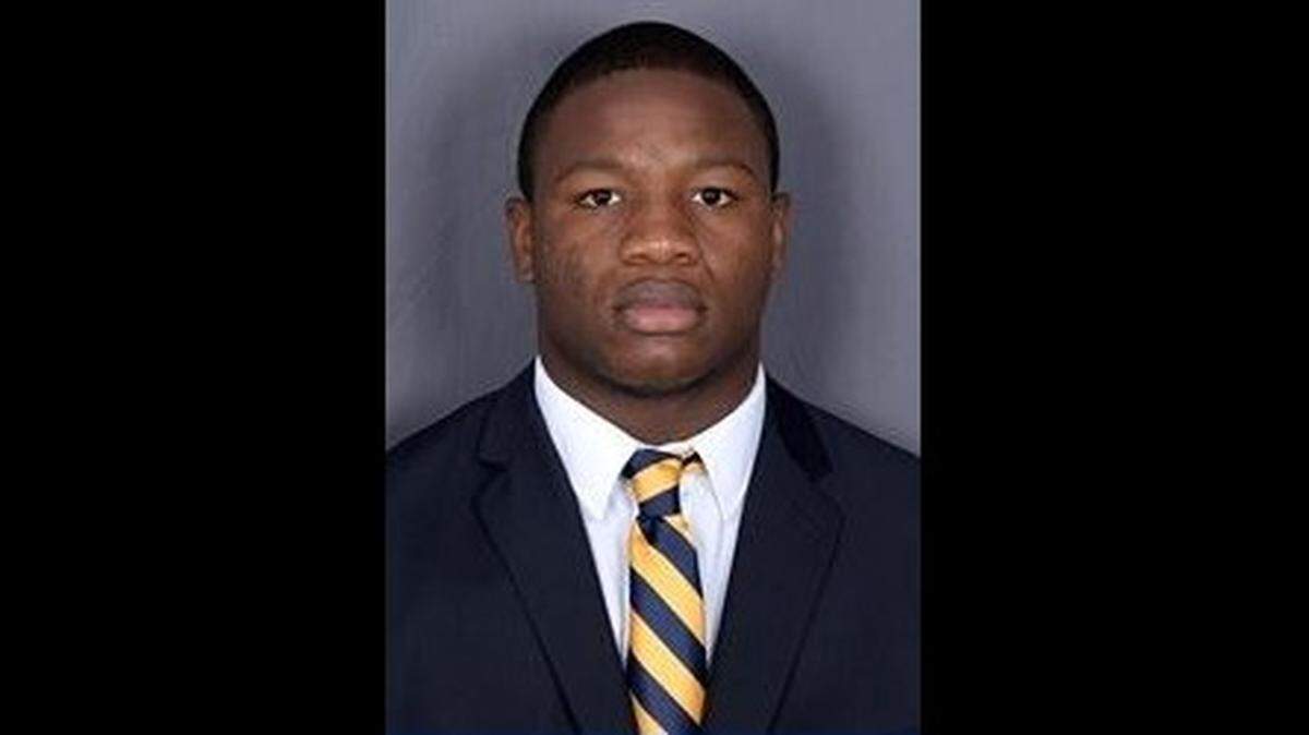 FIU running back Shawndarrius Phillips was left home for the Bahamas Bowl after he was arrested last week on a domestic violence warrant.