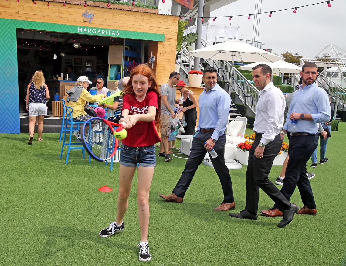 Sawyer Cowden 13, hits a ball at one of the fan booths at Hard Rock Stadium at the 2019 Miami Open in Miami Gardens, Florida, Monday, March, 18, 2019.