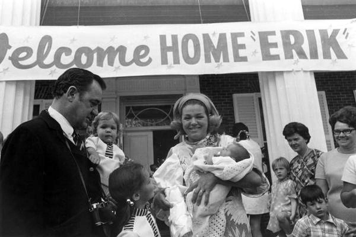 Governor Kirk welcomes home his wife and newborn son Erik Henry Kirk in 1970. | State Archives of Florida