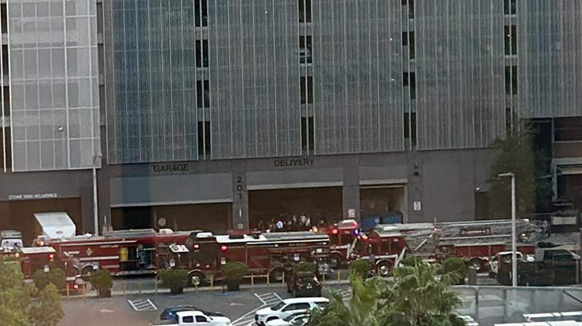 Fort Lauderdale firefighters gather in front of an office building at 201 East Las Olas Boulevard, where a suspicious substance was found, on Wednesday, Nov. 13, 2024.