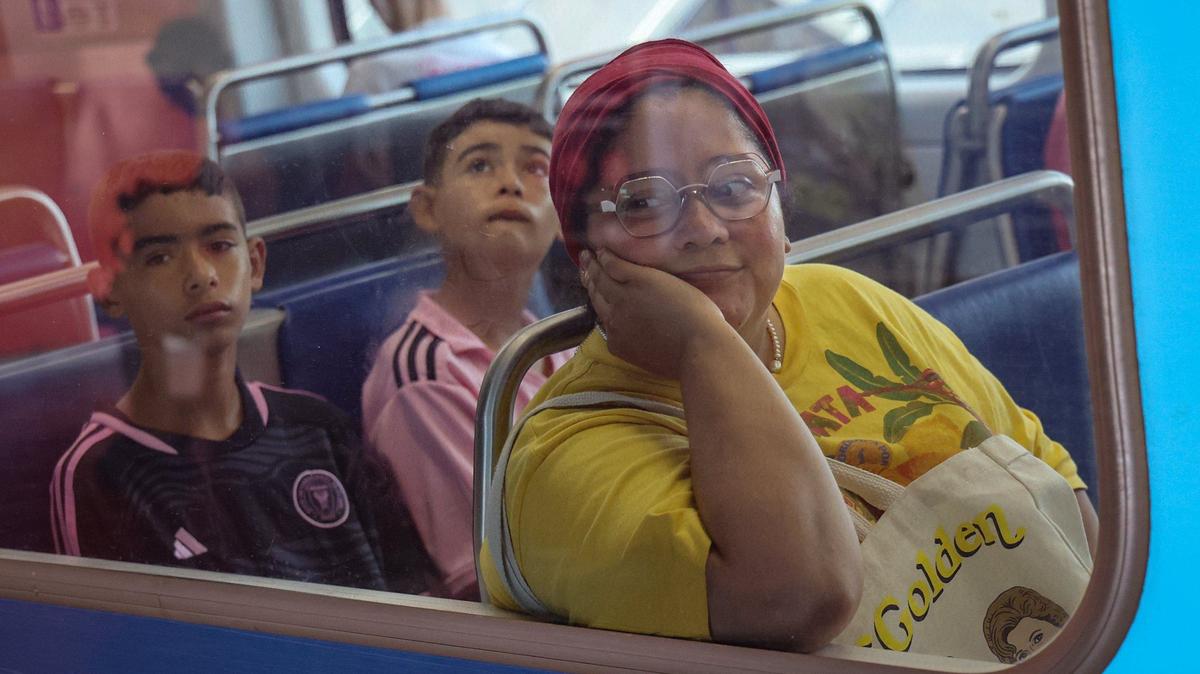 Nonprofit grant administrator Lis Güegüense, 35, right, returns home to Coconut Grove after dropping off her parents at the airport on Wednesday, July 24, 2024. “You can get anywhere if you have a little bit of patience,” says Güegüense.