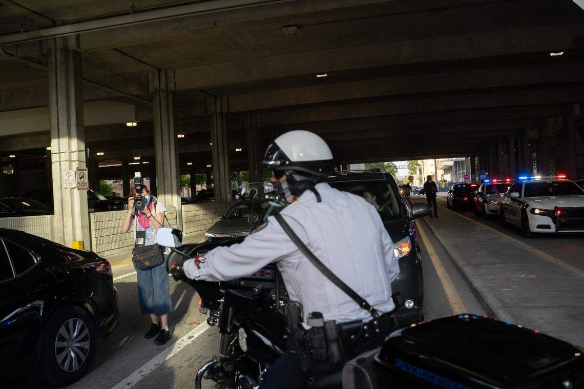 Interaction between police and protesters at SE 1st Ave and SE 2nd Street at 6:51:36 p.m., May 31. Around the same time, an officer in the black Toyota, pictured in the bottom left of the image, radioed for emergency back up saying protesters were jumping on the vehicle.